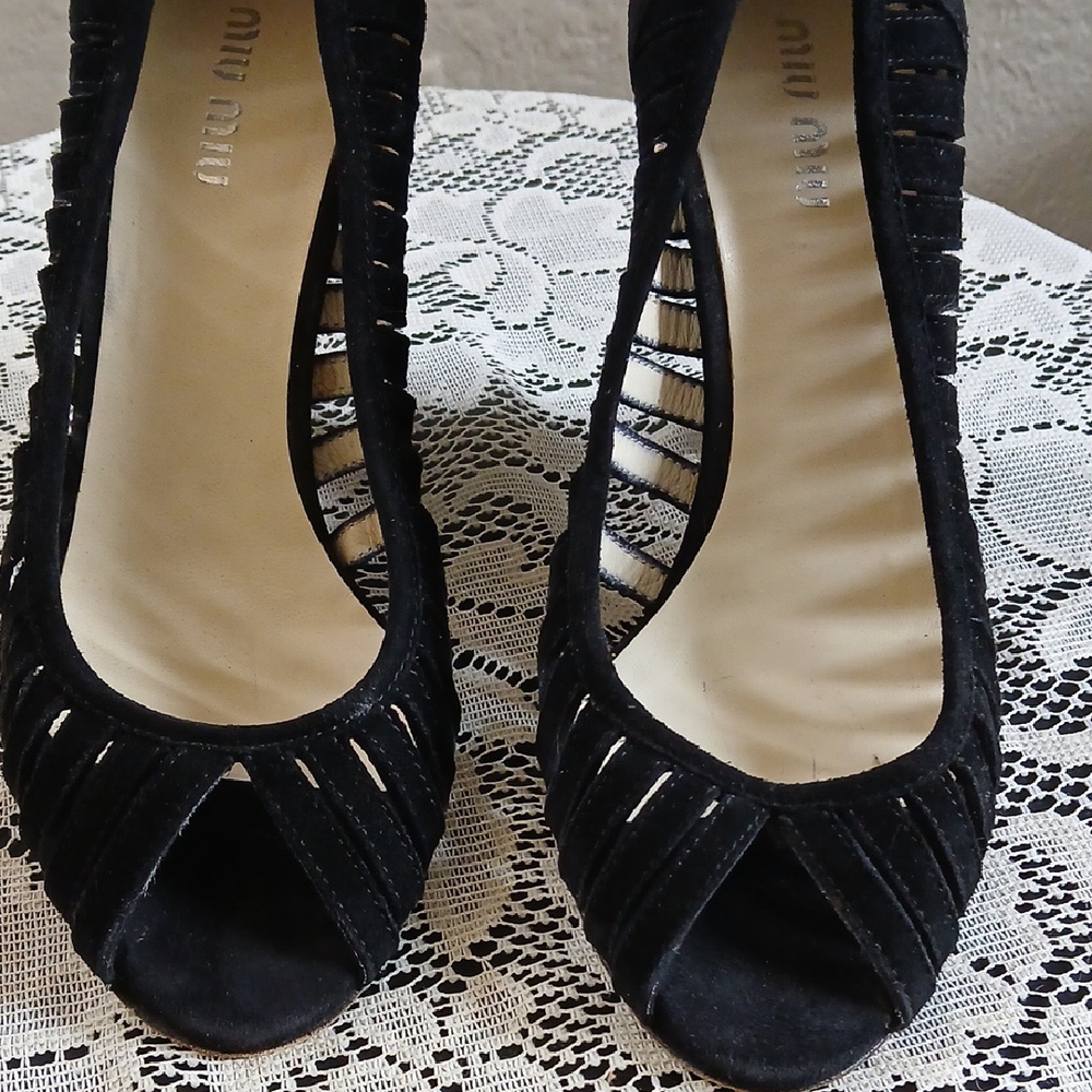 Miu Miu Black Heels with Elegant Cutout Design